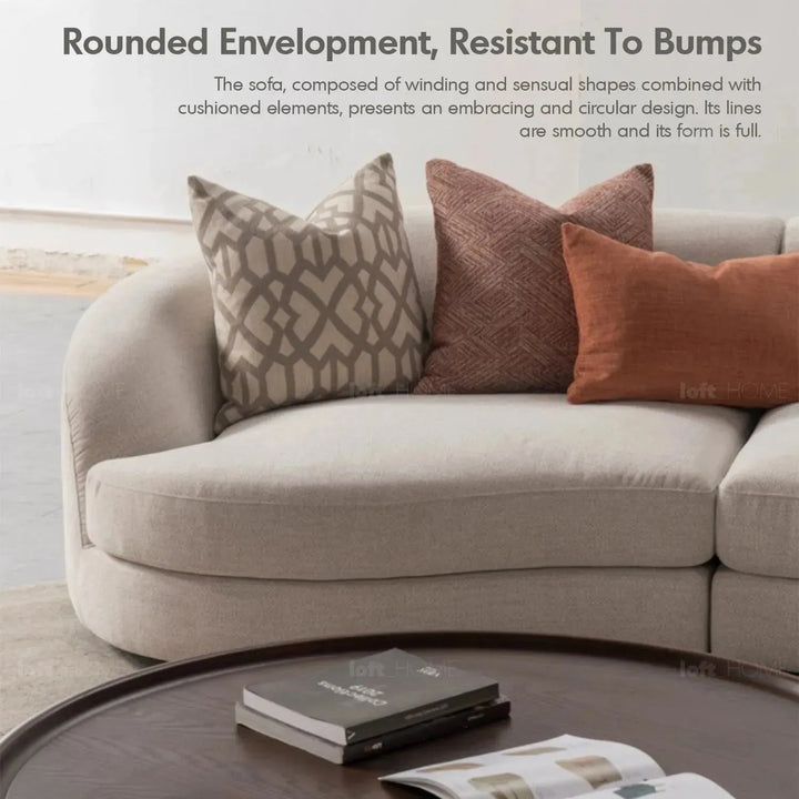 Cream fabric modular 4 seater sofa groove in details.