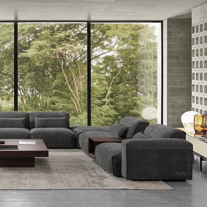 Modern corduroy velvet fabric modular 3 seater sofa opera in still life.