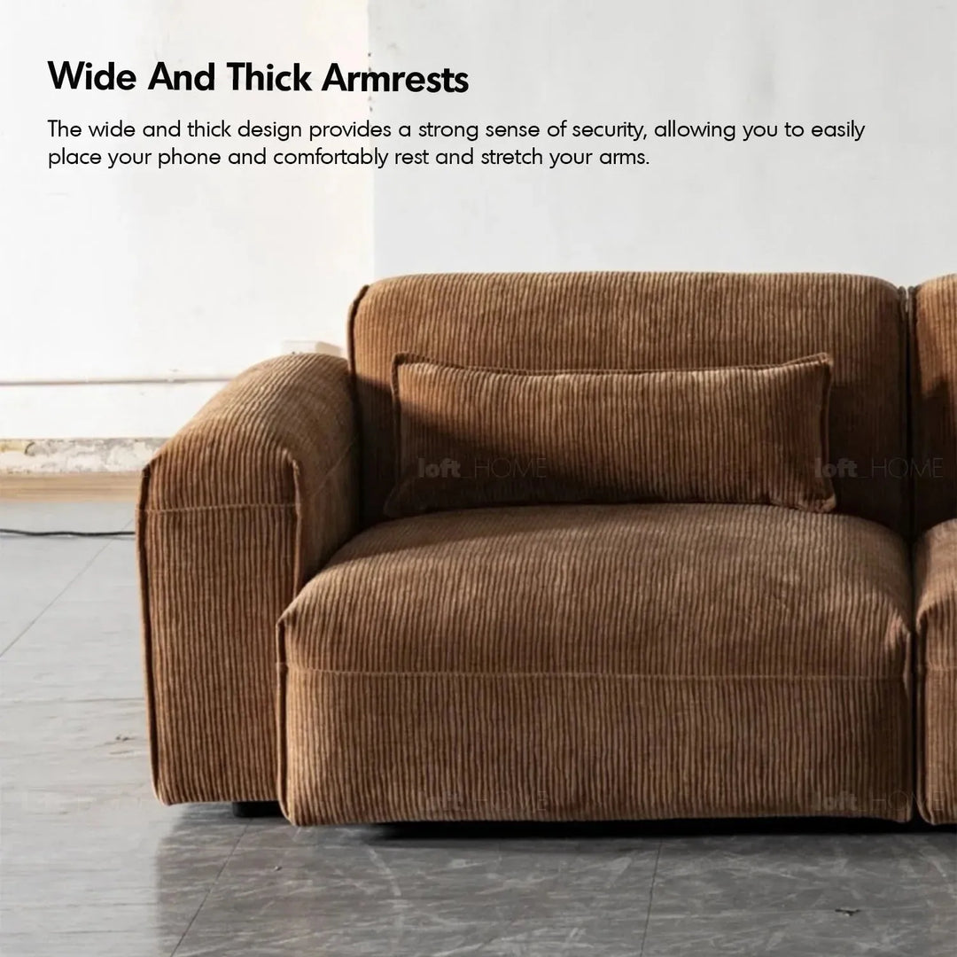 Modern corduroy velvet fabric modular 6 seater sofa opera in close up details.