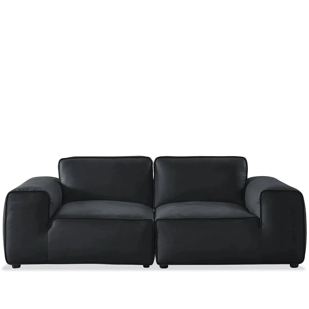Minimalist microfiber leather 3 seater sofa fleece in white background.