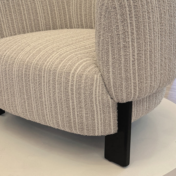 Japandi mixed weave fabric 1 seater sofa embrace in details.