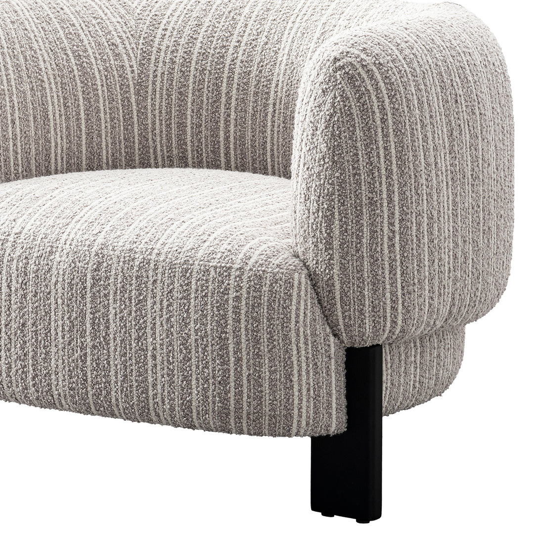 Japandi mixed weave fabric 1 seater sofa embrace in close up details.