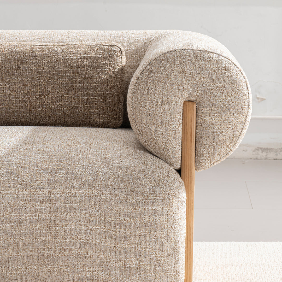 Scandinavian mixed weave fabric 2 seater sofa lange in close up details.
