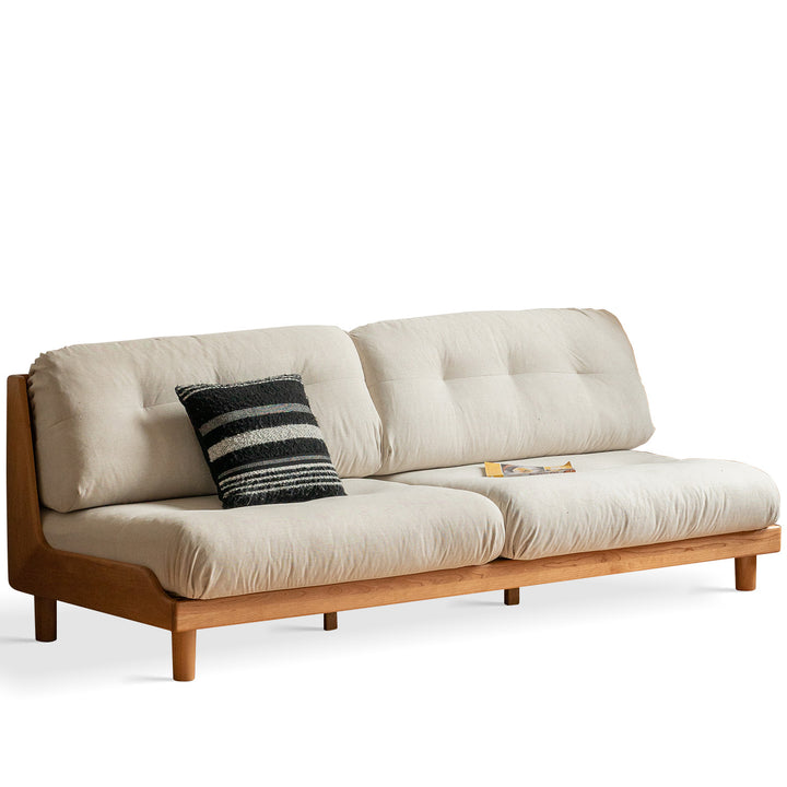 Scandinavian mixed weave fabric cherry wood 3 seater sofa undermoon in close up details.