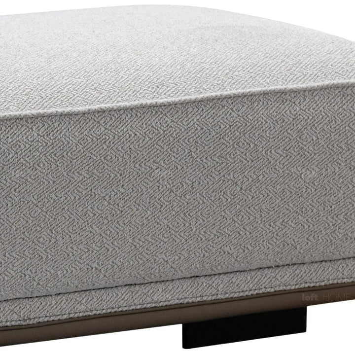 Minimalist mixed weave fabric modular ottoman eleganza l in real life style.
