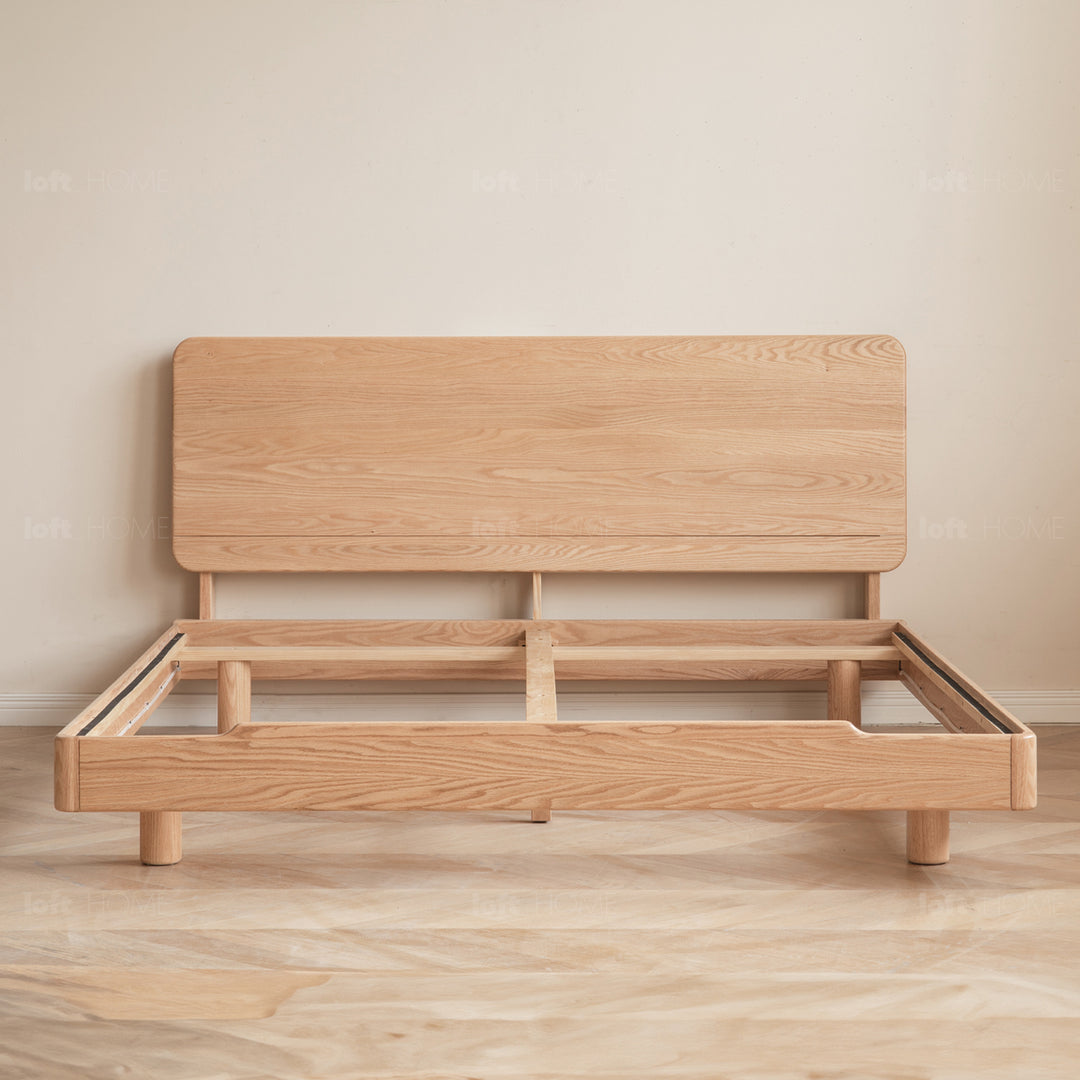 Scandinavian oak wood floating bed glide in panoramic view.