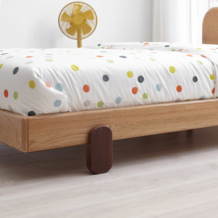 Scandinavian oak wood kids bed peblo in still life.