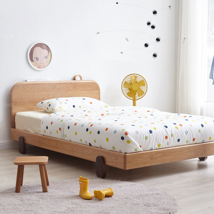Scandinavian oak wood kids bed peblo in real life style.