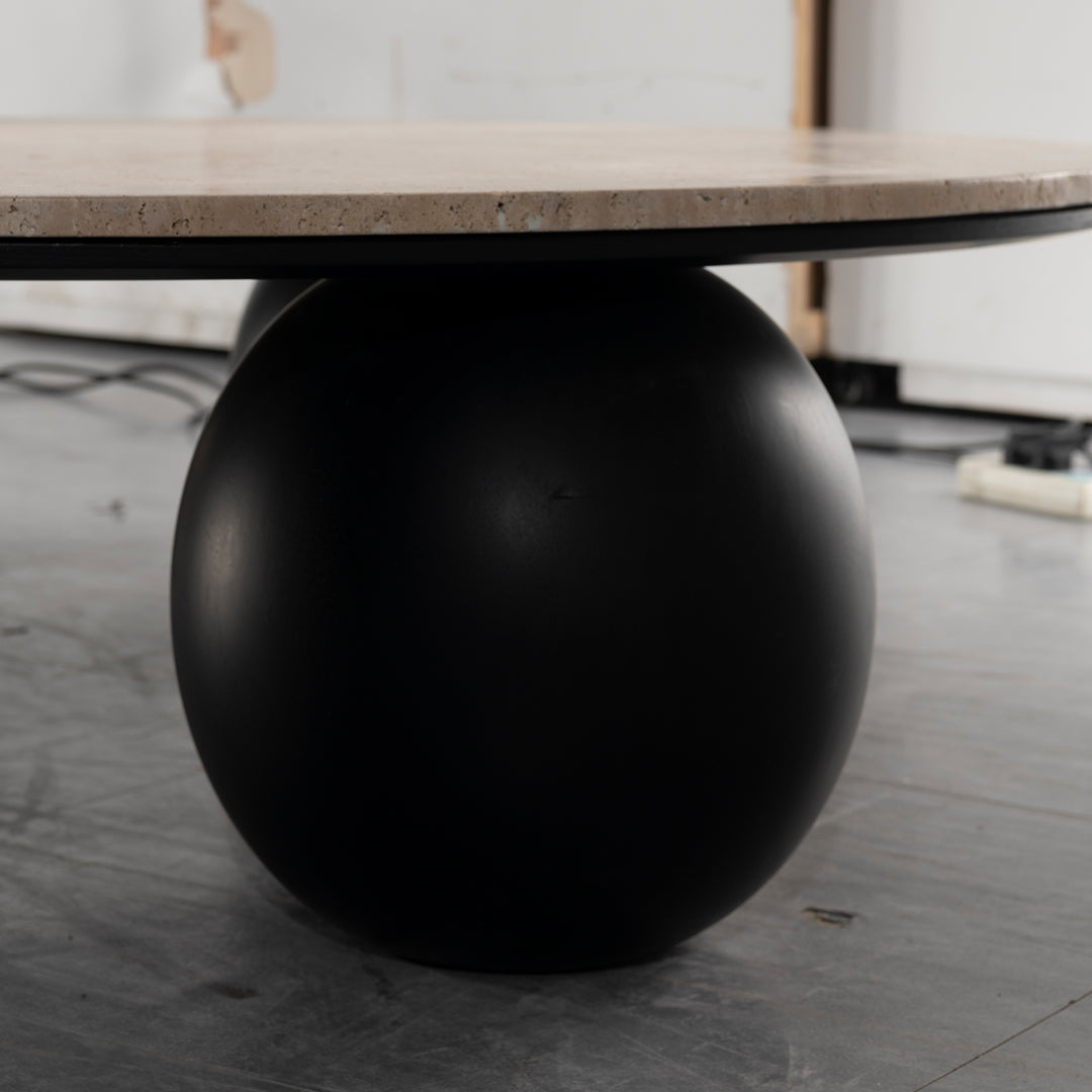 Japandi travertine stone coffee table muckety in details.