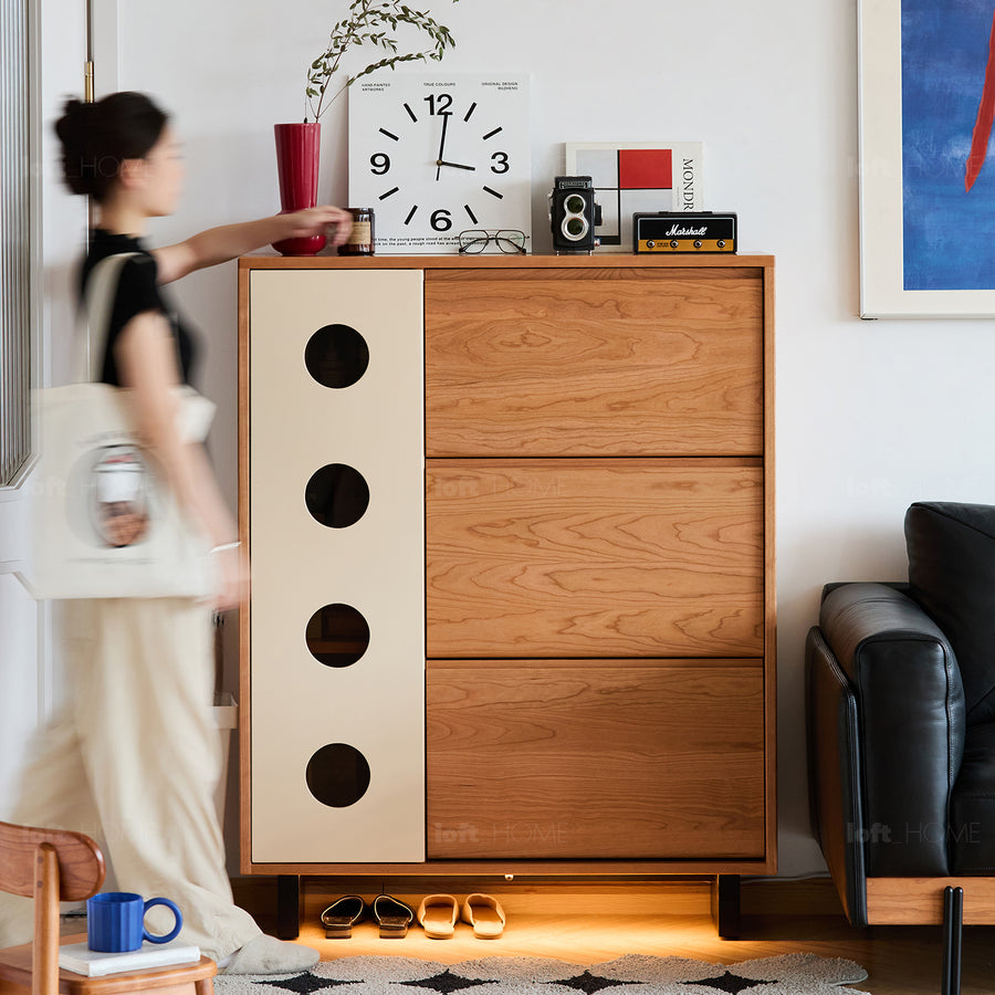 Scandinavian cherry wood shoe cabinet timeless in white background.