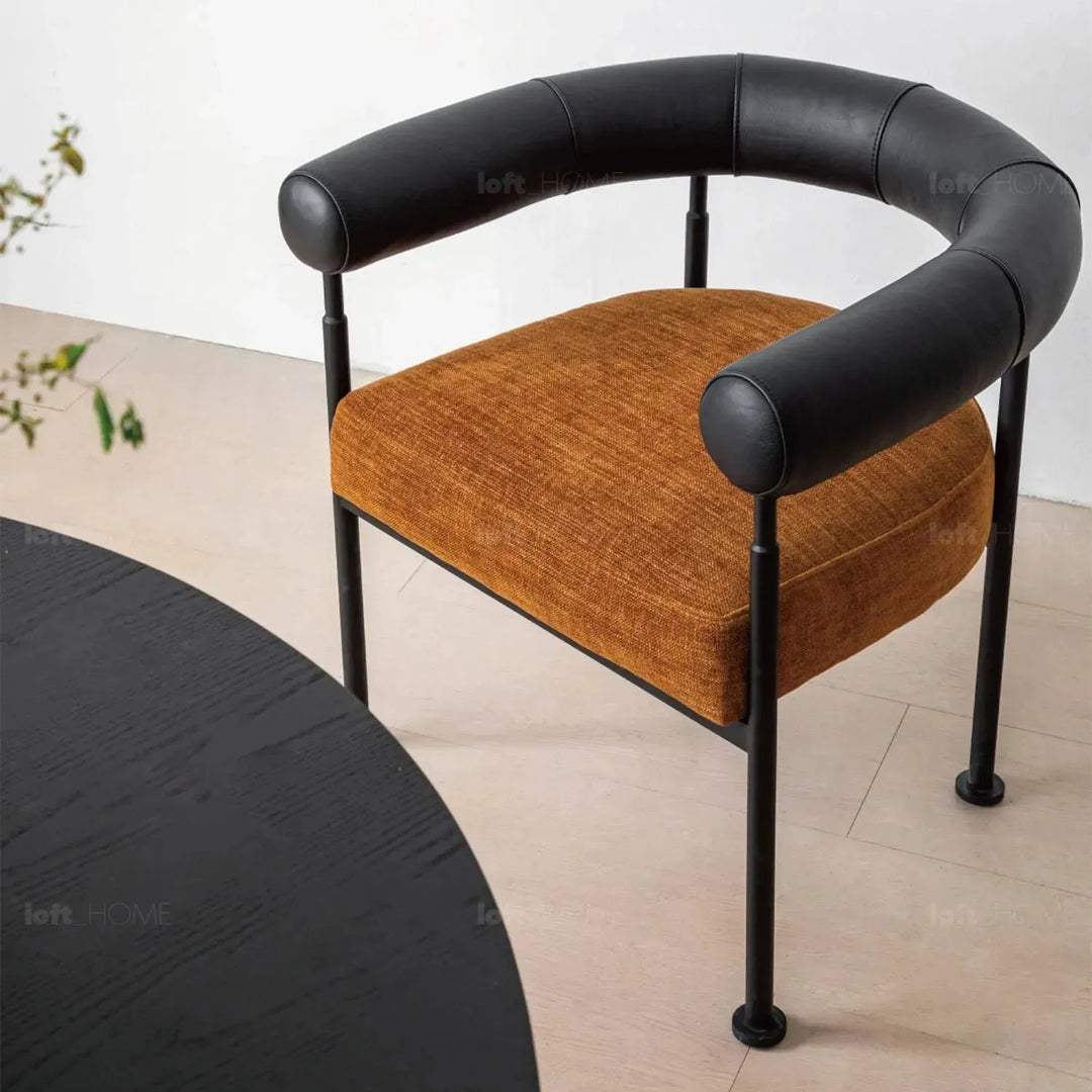 Industrial faux cashmere leather dining chair nost in still life.