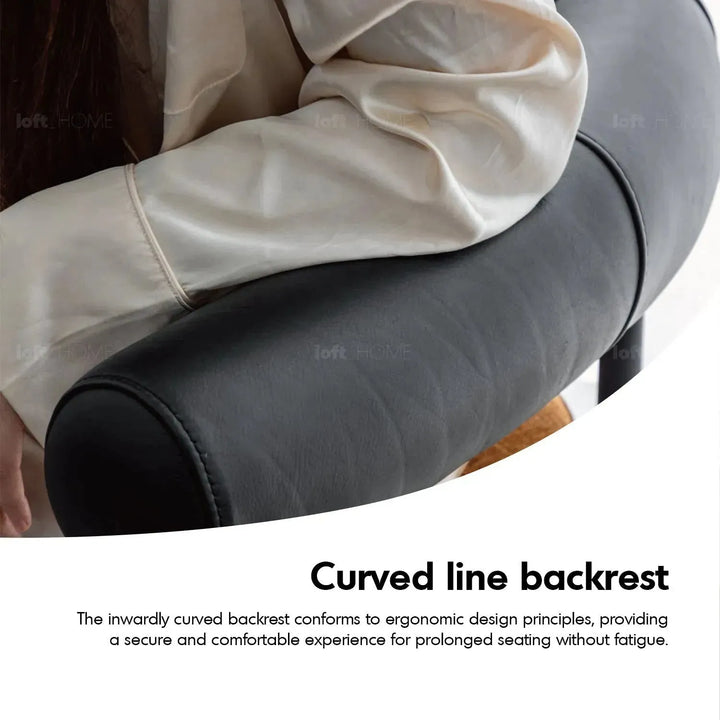 Industrial faux cashmere leather dining chair nost in close up details.