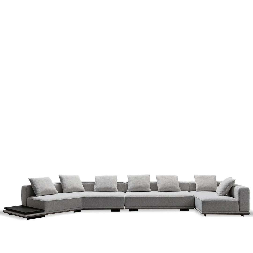 Minimalist mixed weave fabric modular l shape sectional sofa eleganza 7+l in still life.