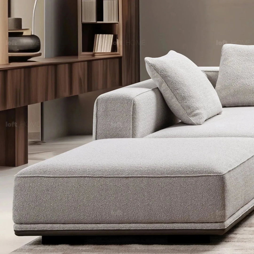 Minimalist mixed weave fabric modular l shape sectional sofa eleganza 7+l in close up details.