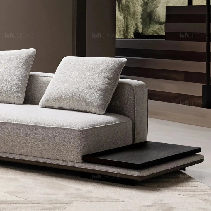 Minimalist mixed weave fabric modular l shape sectional sofa eleganza 7+l in panoramic view.