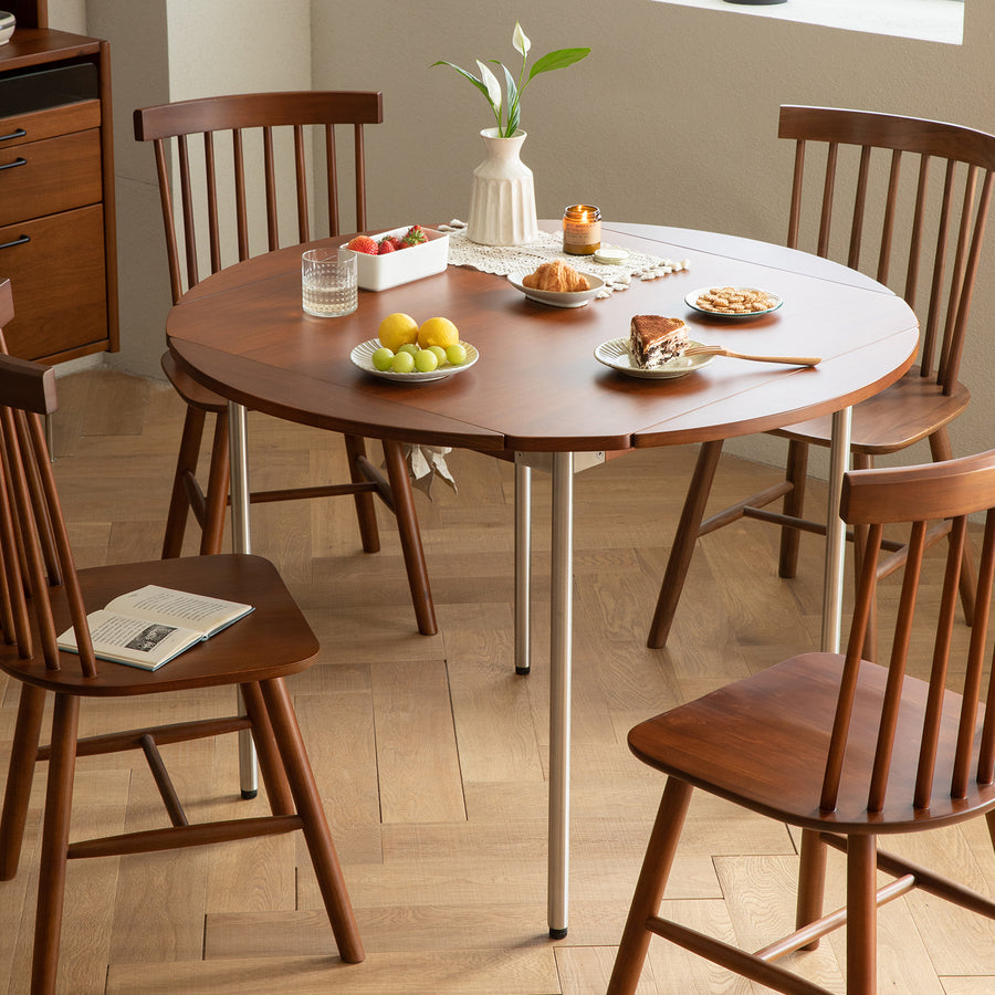 Vintage boxwood extendable round dining table season primary product view.