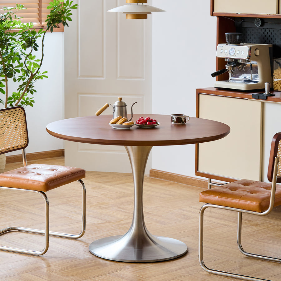 Vintage boxwood stainless steel round dining table tulip primary product view.
