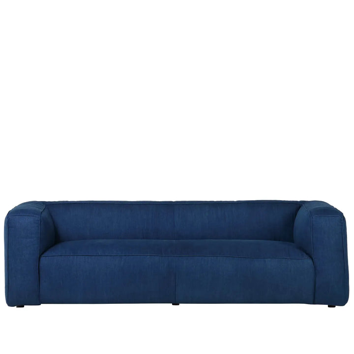 Minimalist canvas fabric 3 seater sofa finesse in white background.
