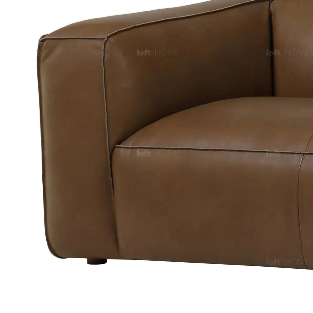 Minimalist genuine leather 3 seater sofa finesse leather in close up details.