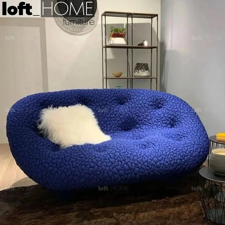 Contemporary fabric 1 seater sofa conch moby with context.