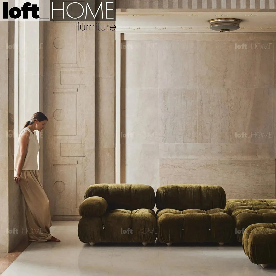 Contemporary fabric 1 seater sofa with armrest camaleonda in still life.
