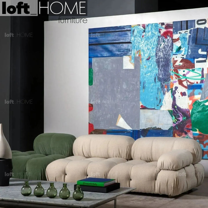 Contemporary fabric 1 seater sofa with armrest camaleonda in details.