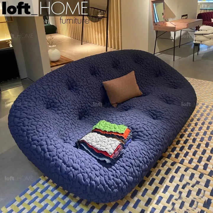 Contemporary fabric 2 seater sofa conch moby with context.