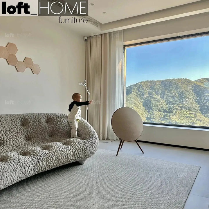 Contemporary fabric 2 seater sofa conch moby layered structure.