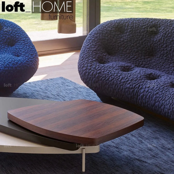 Contemporary fabric 2 seater sofa conch moby in still life.