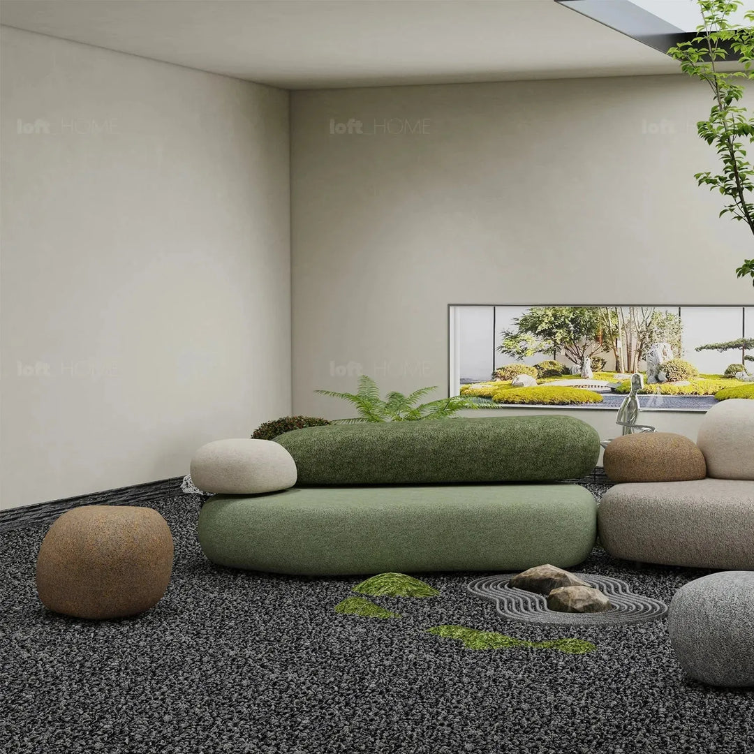 Contemporary fabric 3 seater sofa pebble chaise with context.