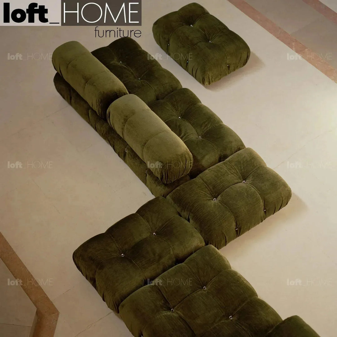 Contemporary fabric 3 seater sofa with ottoman camaleonda in panoramic view.