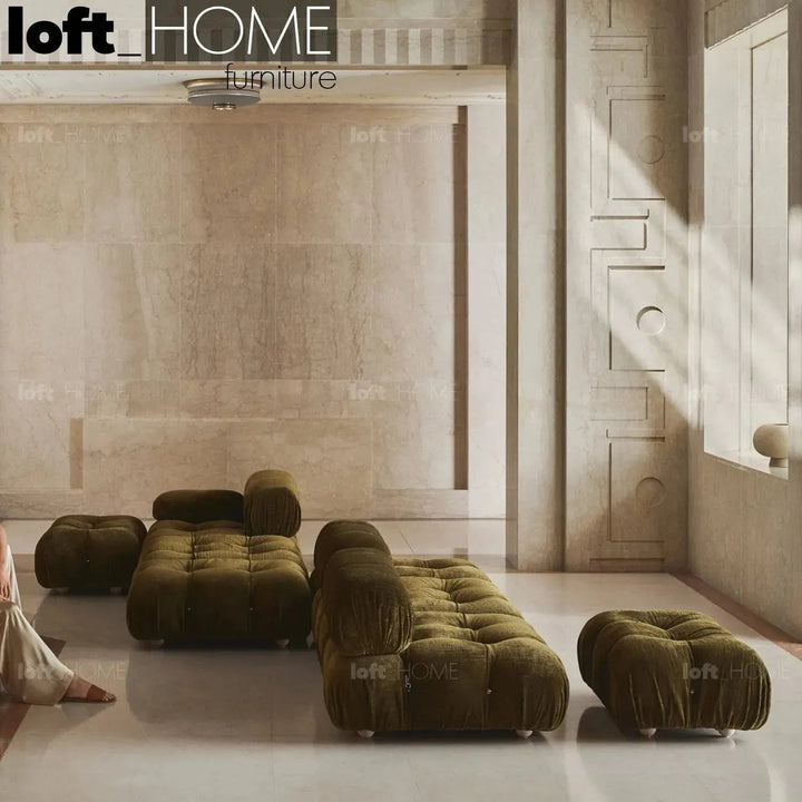 Contemporary fabric 3 seater sofa with ottoman camaleonda in close up details.