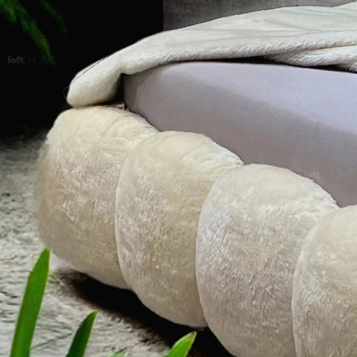 Cream fabric bed pannacotta in details.