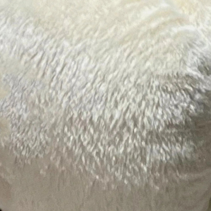 Cream fabric bed pannacotta in panoramic view.