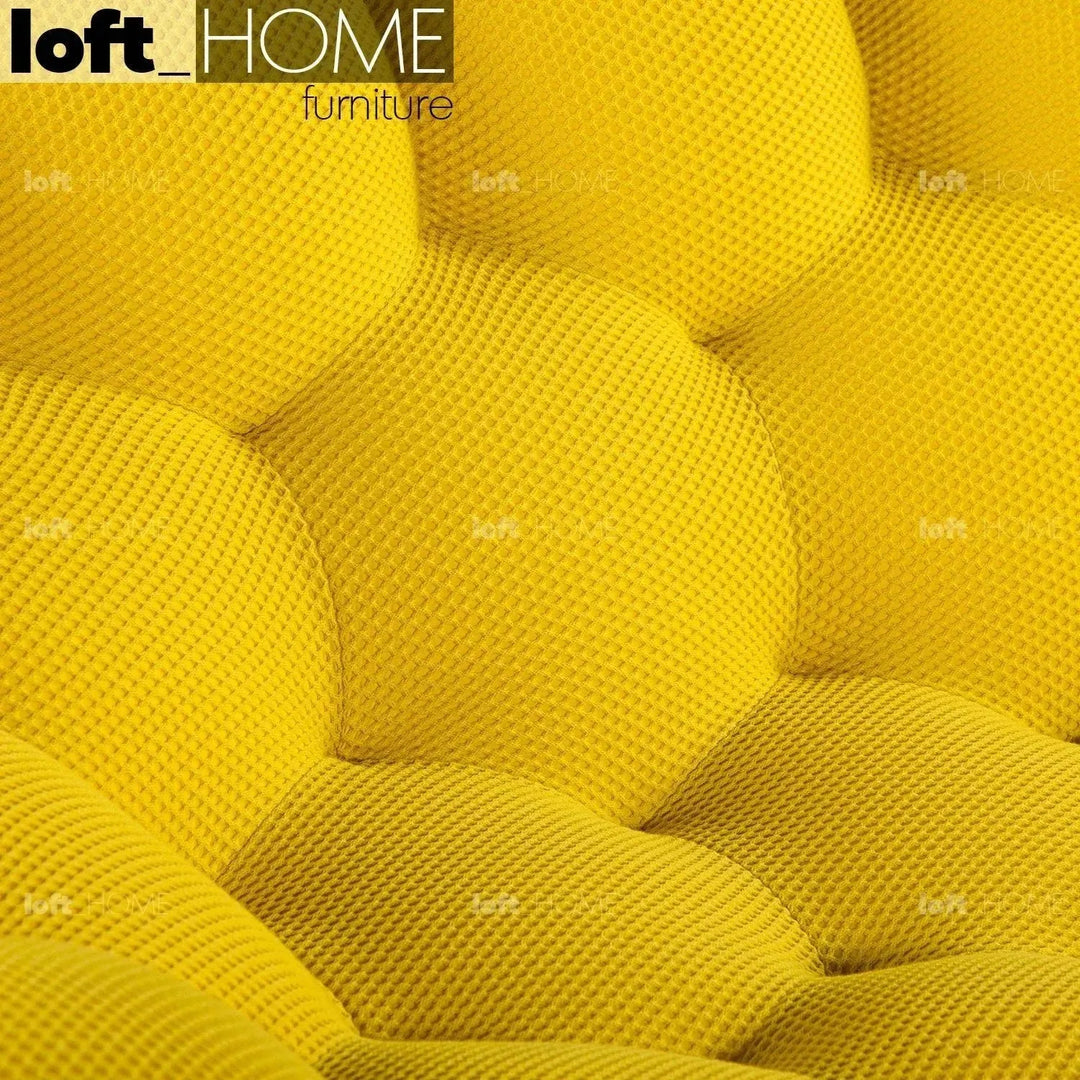 Contemporary fabric curved ottoman bubble in details.