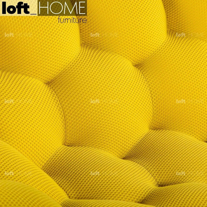 Contemporary fabric curved ottoman bubble in details.