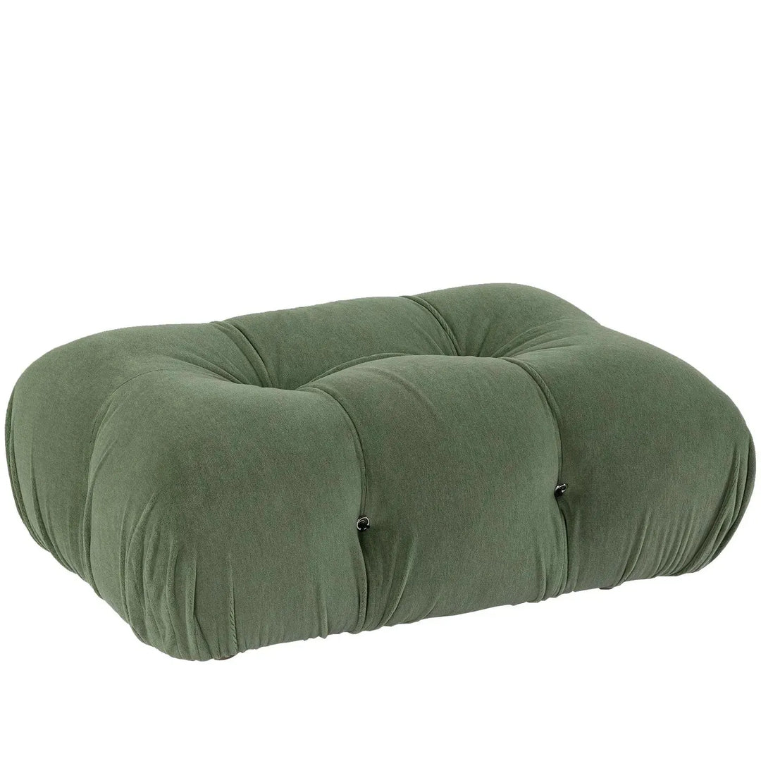 Contemporary fabric ottoman camaleonda in white background.