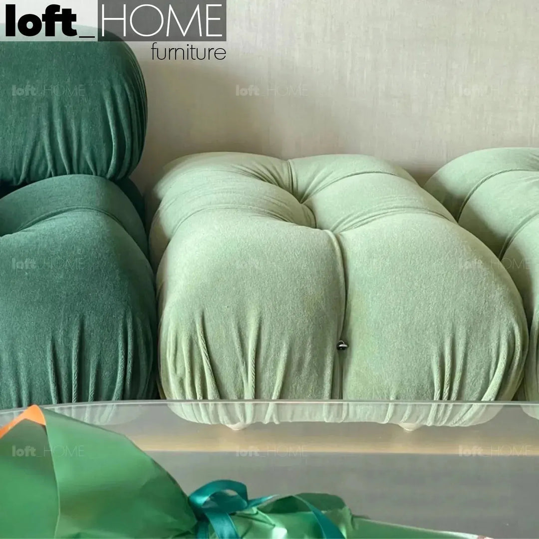 Contemporary fabric ottoman camaleonda in close up details.