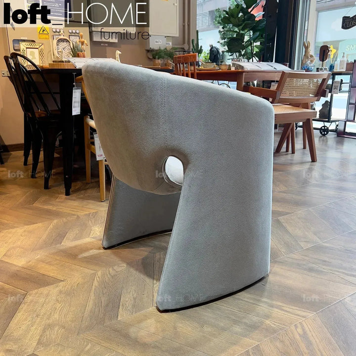 Contemporary velvet dining chair celeste with context.