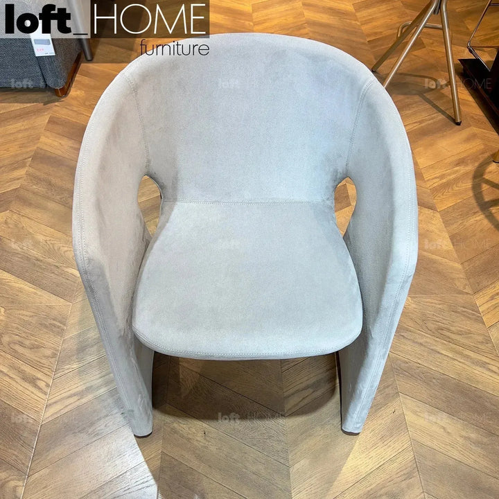 Contemporary velvet dining chair celeste in close up details.