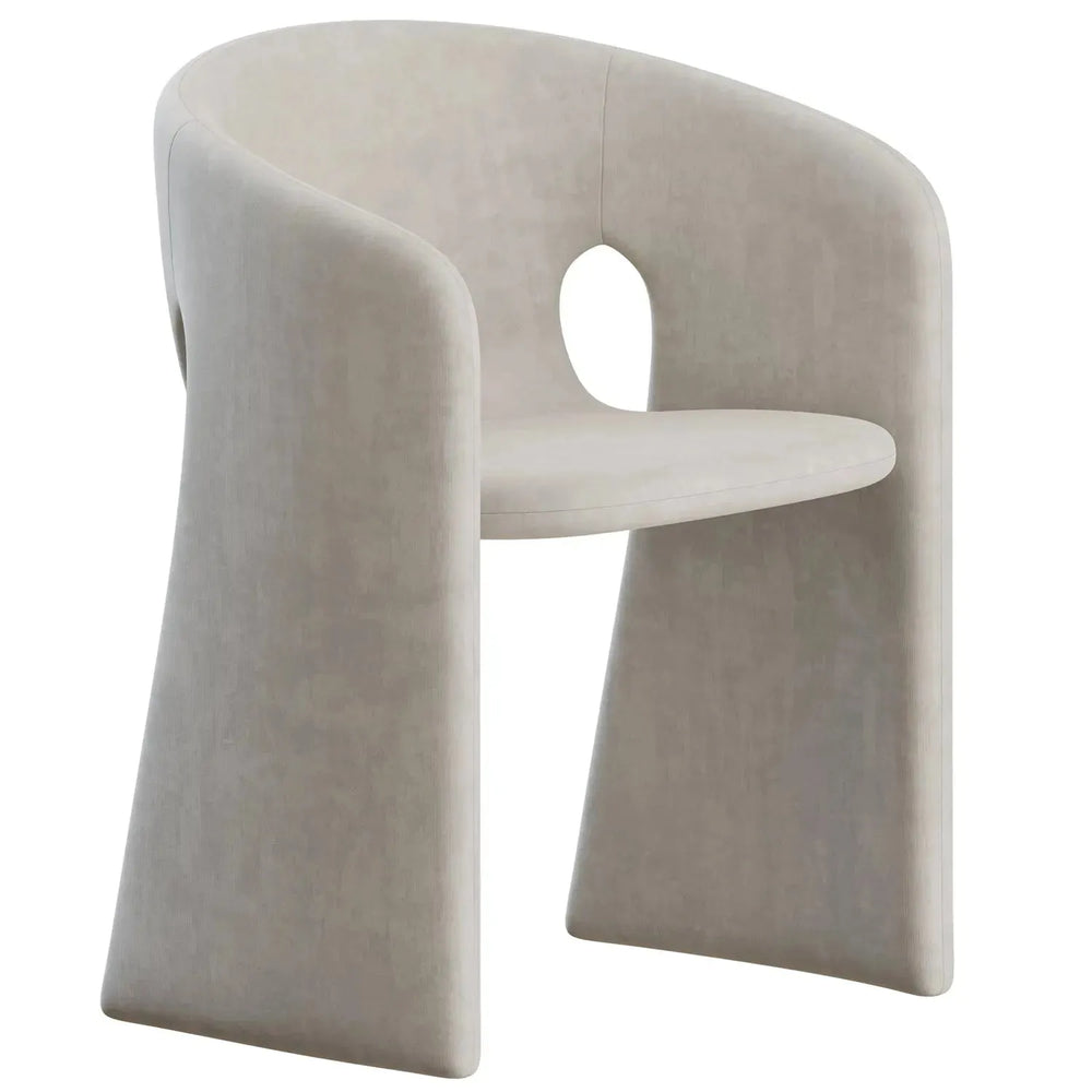 Contemporary velvet dining chair celeste in white background.