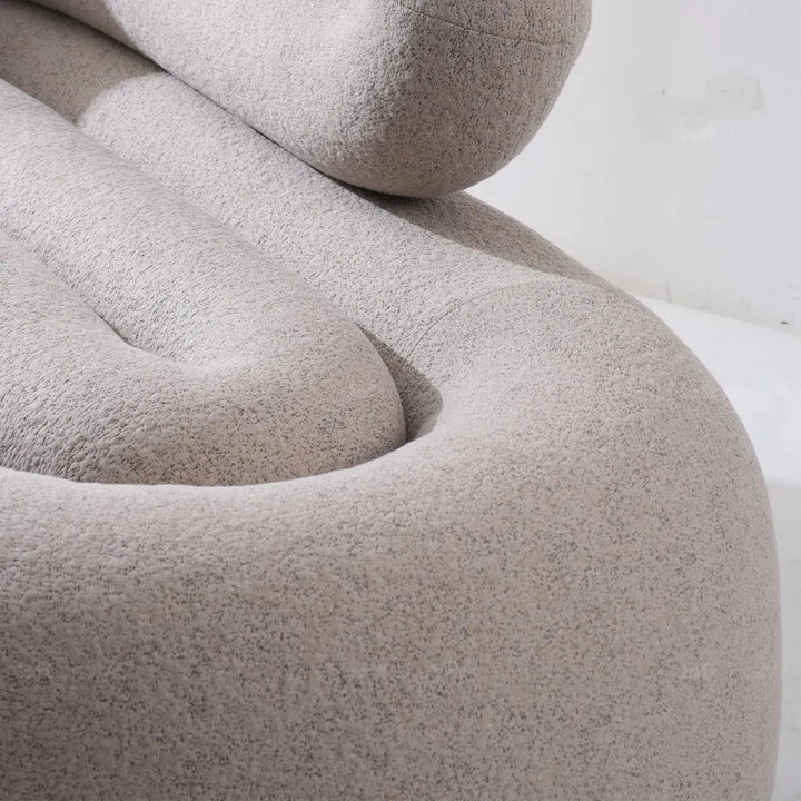 Cream boucle 2 seater sofa meringue in details.