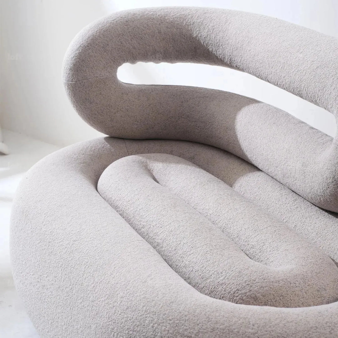 Cream boucle 2 seater sofa meringue in panoramic view.
