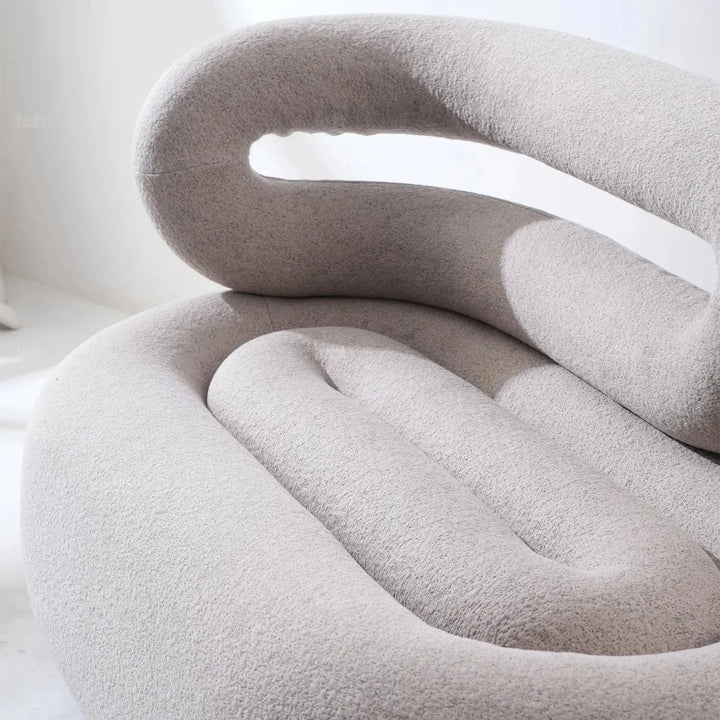Cream boucle 2 seater sofa meringue in panoramic view.