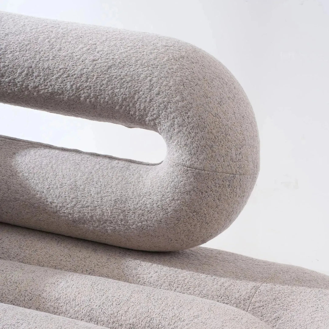 Cream boucle 2 seater sofa meringue with context.