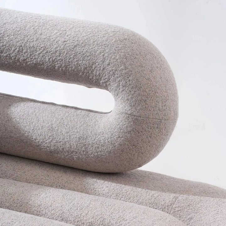 Cream boucle 2 seater sofa meringue with context.
