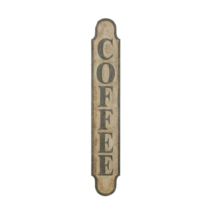 Heavily distressed metal "coffee" wall decor in white background.