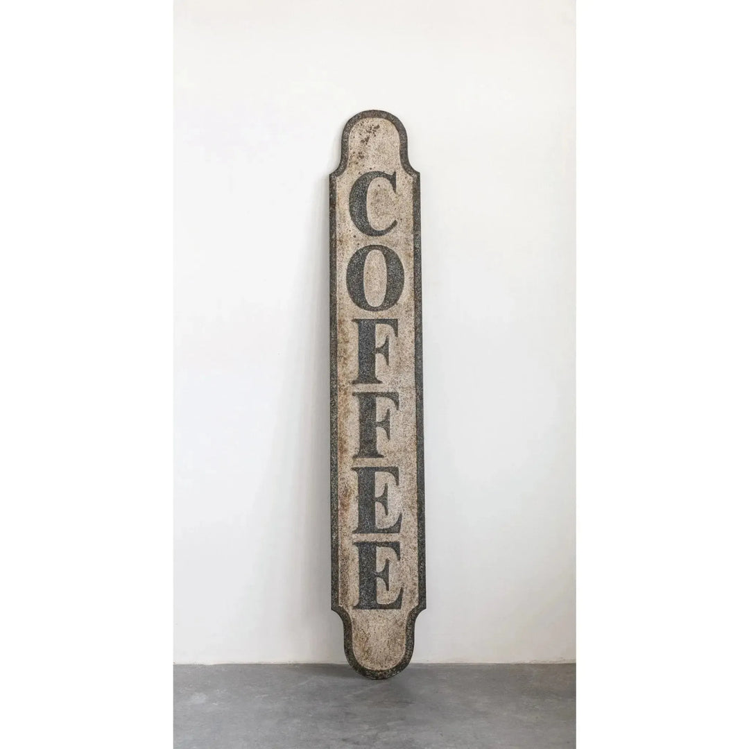 Heavily distressed metal "coffee" wall decor color swatches.