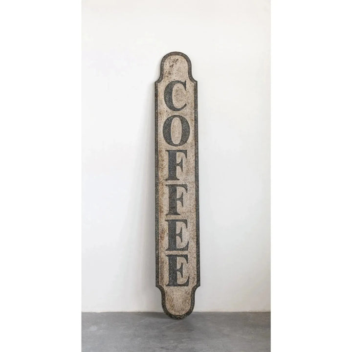 Heavily distressed metal "coffee" wall decor color swatches.