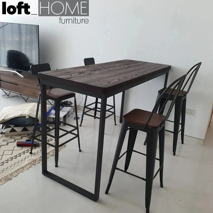 Industrial elm wood bar table hardy with context.